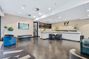 Area soggiorno di Modern 1BR Apt with Gym Pool & Wifi