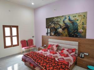 A bed or beds in a room at Super OYO Sree Krishna Hotel &Resort