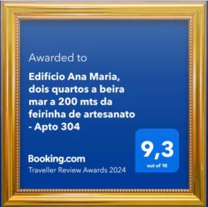 a picture of a framed certificate in a gold frame at Beira-mar na praia de pajuçara com Dois quartos - Apto 304 in Maceió