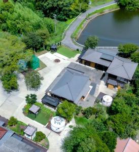 an overhead view of a house with a park at Issyuku Ike Issyo En - Vacation STAY 86605v in Tabuchi