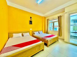 Letto o letti in una camera di Gold's House