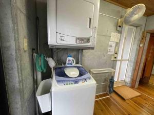 Eldhús eða eldhúskrókur á 桃の木別荘　Momonoki Villa