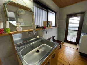 Eldhús eða eldhúskrókur á 桃の木別荘　Momonoki Villa