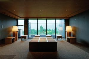 Ein Sitzbereich in der Unterkunft Hakone Kowakien Hotel