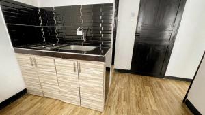 Kuchyň nebo kuchyňský kout v ubytování Apartamentos FM Loft 303