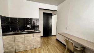 Köök või kööginurk majutusasutuses Apartamentos FM Loft 303