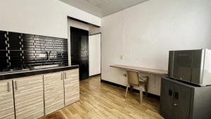Kuchyň nebo kuchyňský kout v ubytování Apartamentos FM Loft 303