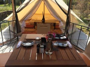a table in a tent with a meal on it at Yamamizuki in Shimanto +102 photos