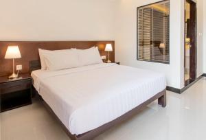Letto o letti in una camera di Cambodian Country Club