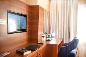 TV o dispositivi per l'intrattenimento presso Kumari Boutique Hotel