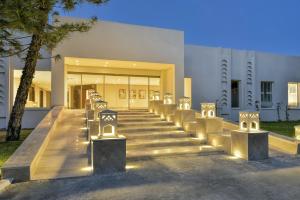 a group of steps leading to a building with lights at Iberostar Selection Diar El Andalous in Port El Kantaoui