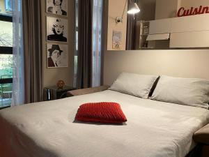 Кровать или кровати в номере Studio Navigli Lombardini 8