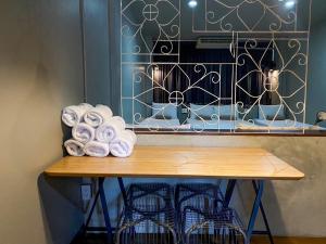 a counter with a bunch of paper towels on it at Yaksa Private in Bangkok +128 photos