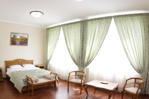 Кровать или кровати в номере Александровская слобода