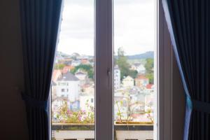 Nespecifikovaný výhled na destinaci Dalat nebo výhled na město při pohledu z hotelu