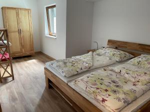 Posteľ alebo postele v izbe v ubytovaní Ferienwohnung Seestern-Mondsee
