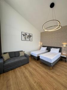 Letto o letti in una camera di Triangle Rooms