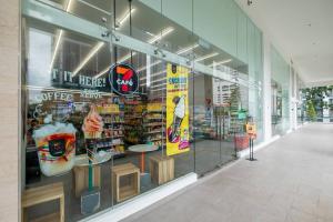 a store front window of a grocery store at Muji Home Lavile KL Sunway Velocity 双威永乐城中文房东Pool in Kuala Lumpur
