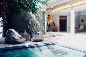 Bazén v ubytování Bali Bliss Private Villa Pulau nebo v jeho okolí