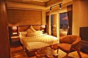 Ένα ή περισσότερα κρεβάτια σε δωμάτιο στο Wonder Woods Boutique Hotel