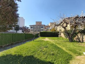 Taman di luar CASITA ENFRENTE DEL CASTILLO DE MEDINA +4 gambar