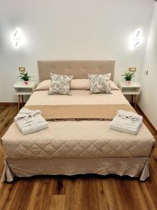 Säng eller sängar i ett rum på B&B Italo House