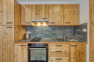 Kuchyň nebo kuchyňský kout v ubytování Apartments Viktor