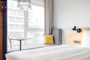 Letto o letti in una camera di Hotel Schani Wien Hauptbahnhof