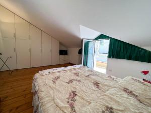 Ένα ή περισσότερα κρεβάτια σε δωμάτιο στο 70 Villetta indipendente con giardino