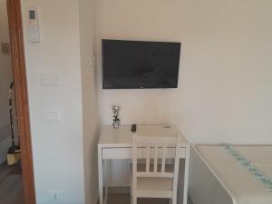TV a/nebo společenská místnost v ubytování CASA FANNI- rooms