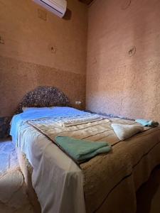 Cama o camas de una habitación en Riad Nkob