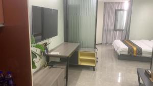 Letto o letti in una camera di Yoyo Apartment Jiedeng Metropolis Branch, Beijing Road