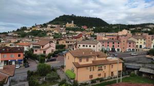 a view of a town with a mountain at Lago di Garda VC, dimora Charme of Butterfly in Cavaion Veronese