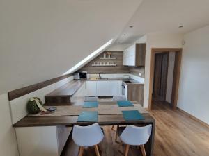 Kuchyň nebo kuchyňský kout v ubytování Apartmán Art