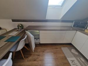 Kuchyň nebo kuchyňský kout v ubytování Apartmán Art