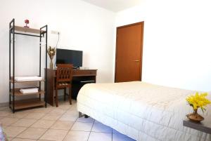 Posteľ alebo postele v izbe v ubytovaní B&B Severini