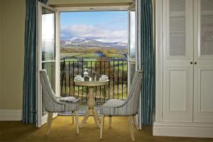 A balcony or terrace at Step House Hotel