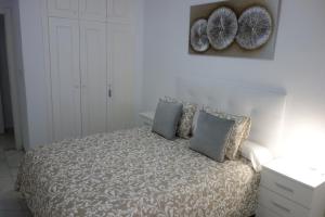 Postel nebo postele na pokoji v ubytování Apartamento Playa Velilla Park II