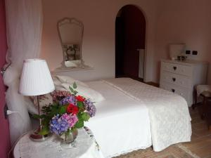 Posteľ alebo postele v izbe v ubytovaní Villa San Giorgio