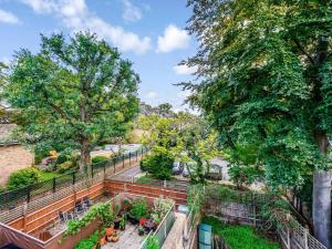 an overhead view of a park with trees and plants at Pass the Keys The Southside - Stylish Apartment with Private Terraces near Barnes & Putney in London