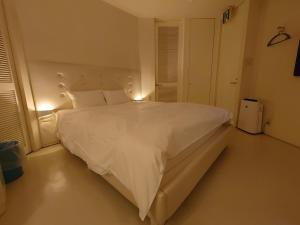 Letto o letti in una camera di Hotel Forest