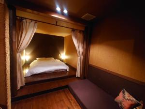 Letto o letti in una camera di Hotel Forest