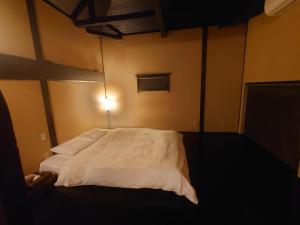 Letto o letti in una camera di Hotel Forest