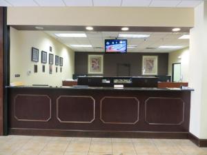 a large room with a large counter and a large mirror at FantasyWorld Resort in Kissimmee