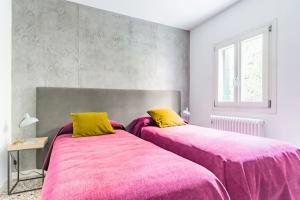 Posteľ alebo postele v izbe v ubytovaní Ca' Mocenigo