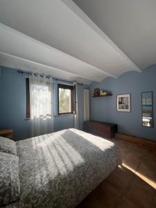 A bed or beds in a room at I Tamerici