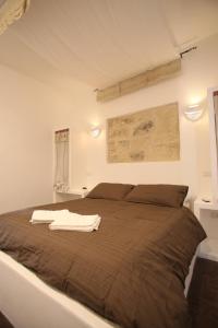 Ένα ή περισσότερα κρεβάτια σε δωμάτιο στο Rifugio Degli Svevi