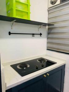 Virtuvė arba virtuvėlė apgyvendinimo įstaigoje Cozy Accommodation at KLTS