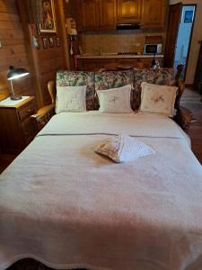 Katil atau katil-katil dalam bilik di La casa nell'airetta