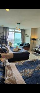 Posezení v ubytování Ksl D'esplanade Studio Apartment's 1